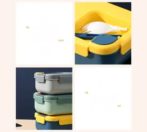 Detail view of lunch box showing spoon storage compartment and secure side sealing buckles