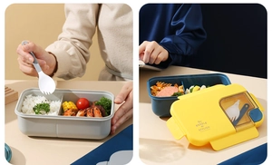 Detail of partitioned lunch box with integrated cutlery and secure airtight buckles