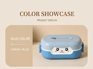 Close-up of blue cartoon kids bento box with side buckles and golden utensils set