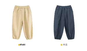 Detail of khaki and navy blue toddler mosquito pants with breathable cotton linen texture