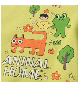 Close-up of light green cotton fabric with cartoon cat and frog illustrations