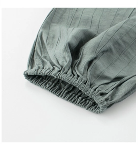 Detail of elastic cuff on sage green toddler anti-mosquito pants with ribbed texture