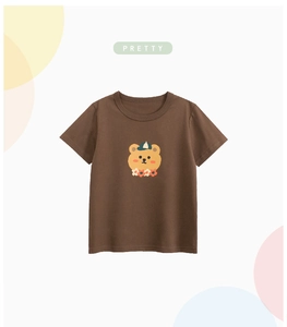 Detail of child cotton T-shirt featuring a cute brown bear cartoon print and soft fabric