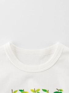 T-shirt enfant en coton blanc avec col rond et motif de fruits colorés imprimés
