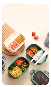 Three-color partitioned bento lunch box with utensils and leak-proof compartment lid