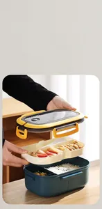 Detail of a 1200ml double-layer bento box with compartments and a portable top handle