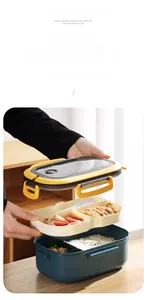 Detail of a 1200ml double-layer bento box with compartments and a portable top handle