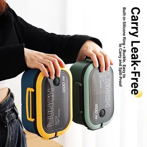 Portable 1200ml divided lunch box with handle and secure seal for microwave use
