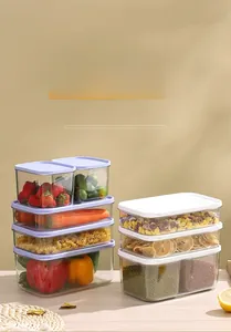 Stackable PET storage containers showing fresh strawberries and vegetables in a kitchen setting