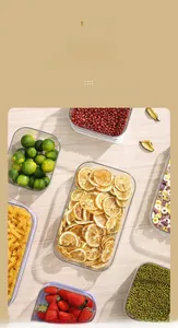 Macro view of transparent PET food containers with airtight purple seals on wood