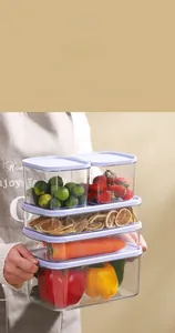 Detail of stacked airtight PET food storage containers with lavender lids for fridge