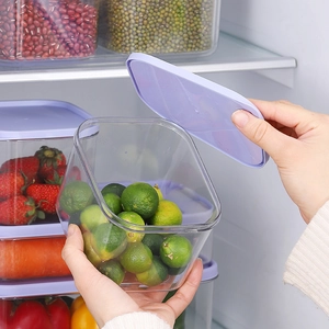 A set of PET airtight kitchen storage containers with purple lids for fridge organization
