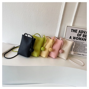 Mini crossbody bags in five colors with litchi grain texture and knotted shoulder straps