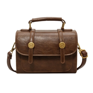 Brown vintage faux leather crossbody bag with gold hardware and top handle for women