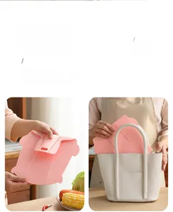 Detailed view of pink foldable silicone cutting board showing portable multi-stage design