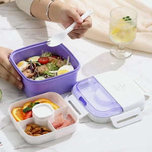 Dual-layer portable lunch box with divided compartments and utensils in lavender purple