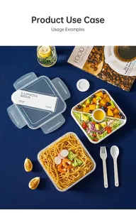 Top-down view of a 1100ml divided lunch box set with cutlery on a deep blue surface