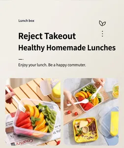 Detail view of leakproof yellow lunch box with utensils and divided inner compartments