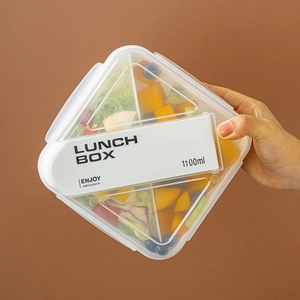 1100ml multi-compartment salad lunch box with clear lid and fresh fruit salad