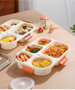 Detail of five-compartment lunch box with orange buckles and leak-proof seal lid