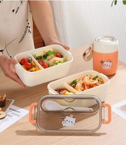 Close-up of double-layer bear lunch box with divided compartments and a soup jar
