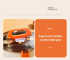 Detail des ergonomischen orangefarbenen Griffs der Cartoon-Edelstahl-Brotdose zum Tragen