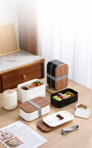 Double-layer bento box with wood grain lid, matching soup jar and cutlery set
