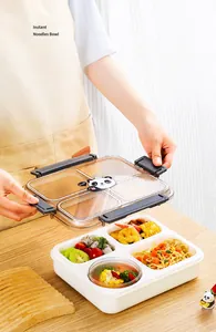 Detail of a 4-compartment plastic lunch box with a cute panda lid and small soup bowl