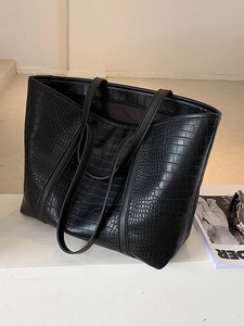 Large black crocodile pattern leather tote bag with elegant long shoulder straps for women
