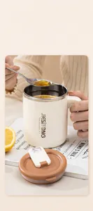 Detailed view of 304 stainless steel insulated mug with handle and sliding lid design