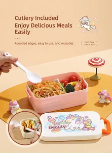 Close-up of pink unicorn cartoon bento box with pasta and reusable fork spoon set