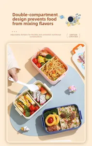 Close-up of cartoon lunch box with dual compartments, removable divider and spoon