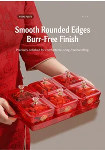 Detail of red transparent candy tray with six removable compartments and crystal handles