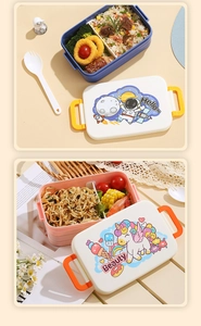 Detail view of dual-compartment cartoon bento boxes with secure side buckles for kids