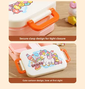 Detail of the pink unicorn bento box featuring secure side buckles and dual-layer structure