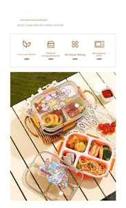 Detail of multi-compartment lunch box with cartoon bear lid and dipping container