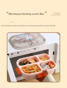Pink 4-compartment bento box with unicorn lid being taken out of a microwave oven