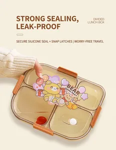 Close-up of four-compartment lunch box with cartoon bear lid and orange locking clips