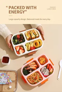 Divided lunch box with four compartments and unicorn decals showing food storage