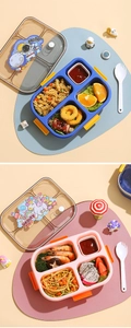 Close-up of a 4-compartment kids bento box with cartoon prints and sealing lid