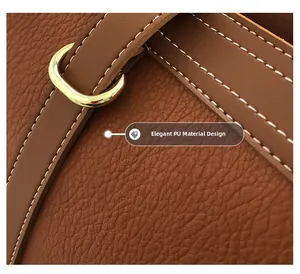 Macro shot of brown PU leather bag with lychee texture and golden metal buckle details