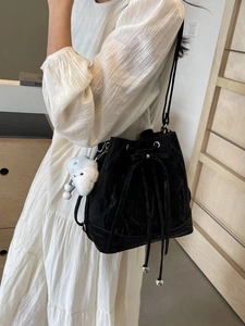 Fashionable black bucket bag with pleated texture and cute cloud charm pendant