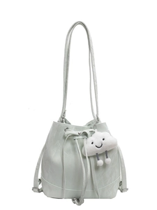 Mint green drawstring bucket backpack with cute white cloud pendant on white background