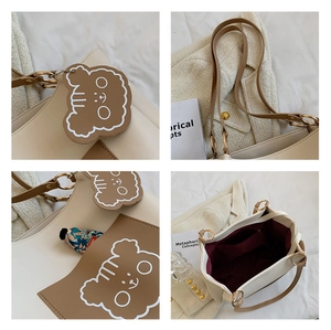 Detail shots of tote bag featuring bear pendant, metal hardware, and spacious red lining