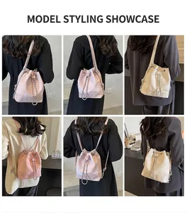 Detailed views of stylish drawstring bucket bag with chain strap in pink and beige