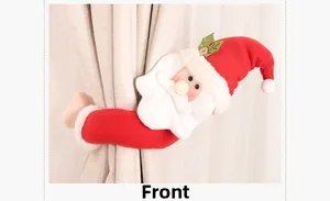 Vue avant de l'embrasse de rideau Père Noël en peluche avec des détails de fête rouges et blancs