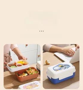 Detailed view of divided double-layer lunch box with cute cartoon prints for food storage