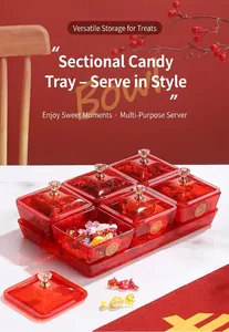 Close-up of a red 6-compartment candy box set with gold double happiness characters