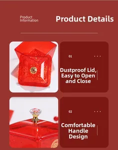 Detail of red wedding candy box with gold double happiness character and diamond handle