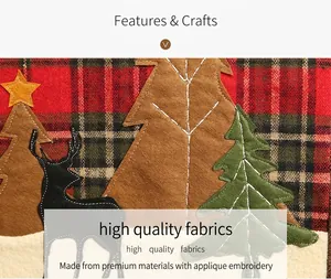 Close-up of Christmas oven mitt with red plaid reindeer and pine tree appliqué details